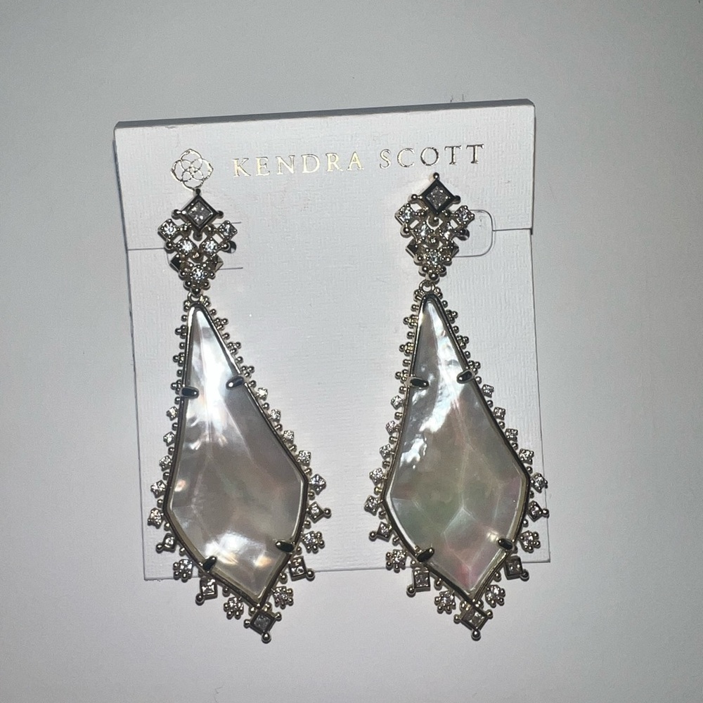 White and gold Kendra Scott earrings